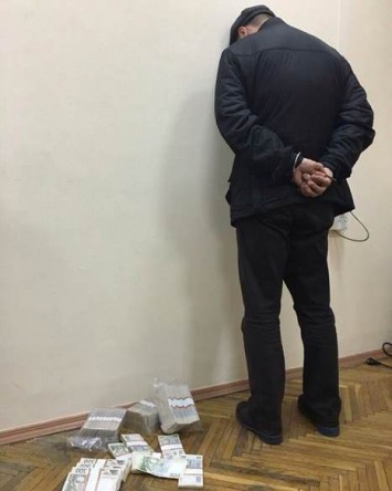В Днепропетровске сотрудников СБУ и МВД задержали на взятке в 1 млн 125 тыс. гривен