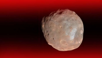 Ученые показали обреченный спутник Марса (ФОТО)