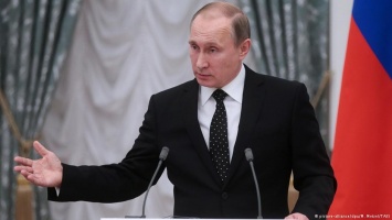 Путин: В борьбе с терроризмом необходимо "создать один мощный кулак"