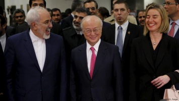Евросоюз и США приостанавливают санкции против Ирана
