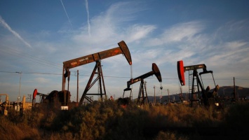 Цена нефти Brent упала ниже $28 на фоне снятия санкций с Ирана