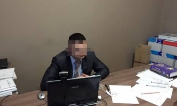 В Ивано-Франковской обл. замруководителя прокуратуры задержали на взятке в 2 тыс. долларов
