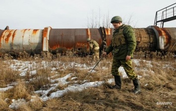 Украинские военные вынуждены были открыть огонь по позициям боевиков в районе Новотроицкого