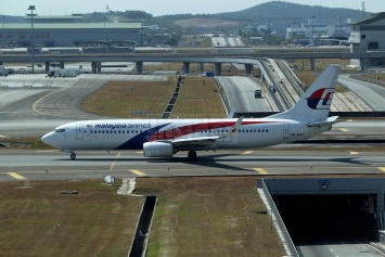 Malaysia Airlines подтвердила, что выплатит компенсации семьям пассажиров пропавшего в 2014 году "Боинга"