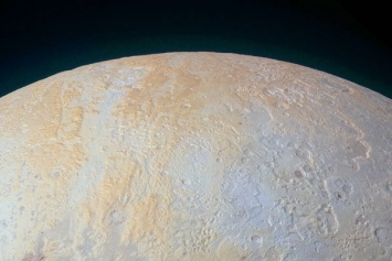 NASA показала снимок ледяных каньонов Плутона