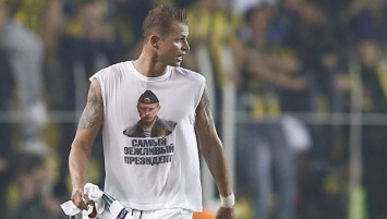 Футбол: УЕФА не стало дисквалифицировать футболиста "Локомотива" за футболку с Путиным