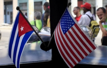 Обама начал визит на Кубу