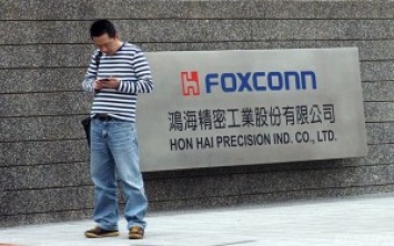 Тайваньская компания Foxconn заменила роботами 60 тысяч работников