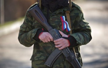 На Донбассе найдены захоронения двух военных с шевронами ВС России