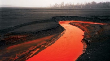 В «Норникеле» объяснили окрашивание воды реки Далдыкан в красный цвет