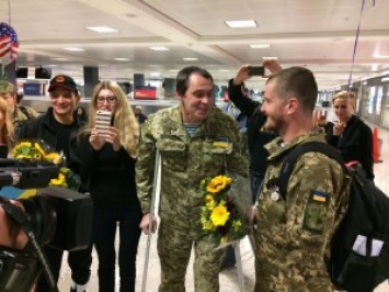 Четверо украинских ветеранов АТО прибыли в Вашингтон для участия в Марафоне Морской пехоты. Один из них - из Николаева