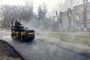 В Каменском приступили к ремонту дороги на улице Нежинской