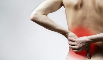 Медики объяснили причины боли в спине