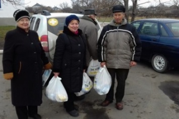 Жители Тельмановского района получили гуманитарную помощь