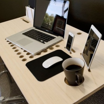 Apple разрабатывает «яблочные» столы для беспроводной зарядки устройств