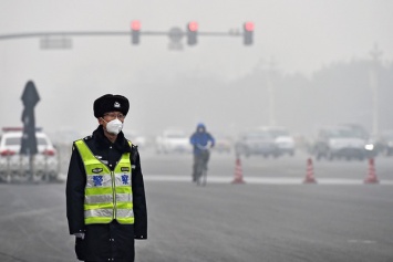 В Китае впервые объявлен наивысший уровень опасности из-за смога
