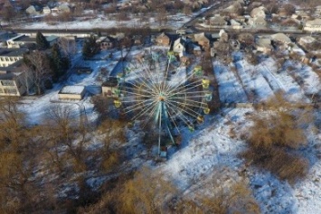 В парке Шеловичном в Славянске демонтируют аттракционы и запустят обновленное колесо обозрения