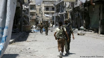 Москва и Дамаск отправили колонну с бронетехникой на помощь курдам