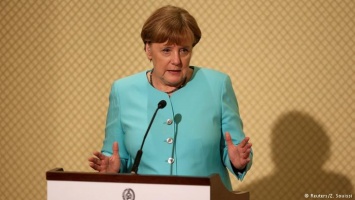 Меркель считает нужным прекратить конфликт с Турцией