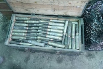 CБУ обнаружила тайник с большим количеством боеприпасов в районе АТО