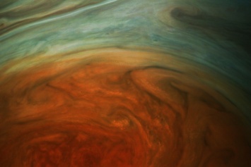 NASA опубликовало первые приближенные фото Большого красного пятна на Юпитере