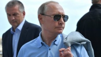 Поцелуй Путина с неизвестной женщиной попал на видео
