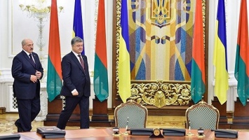 Визит Лукашенко в Киев: амбициозные планы и полуголая девушка