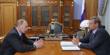 Евтушенков рассказал об обсуждении с Путиным мирового соглашения с "Роснефтью"