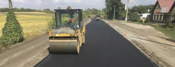 Дорожники ремонтируют трассу Харьков-Ахтырка