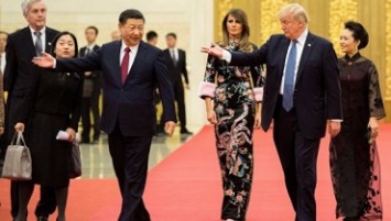 Во время визита Трампа в Китай произошла драка из-за "ядерного чемоданчика"