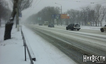 В Николаеве начался снегопад, ветер усиливается