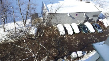 В Киеве на Оболони затопило дорогу (фото, видео)