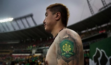КФА запретила татурировки игрокам сборных Китая
