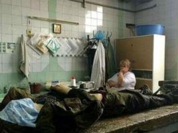 Боевики продолжают подбрасывать в морги Луганска своих "собратьев по оружию"