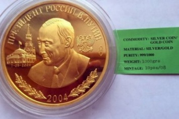 В России выставили на продажу монету «Золотой Путин»