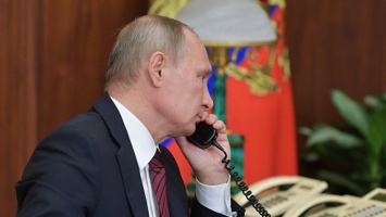 Путин охарактеризовал телефонный звонок Порошенко
