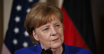 Меркель договорилась с 14 странами ЕС о возвращении беженцев