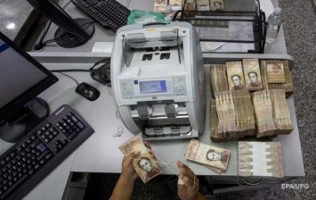 К концу года инфляция в Венесуэле достигнет 1000000% - МВФ