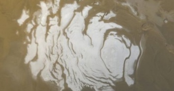 Ученые обнаружили жидкую воду на Марсе (фото)