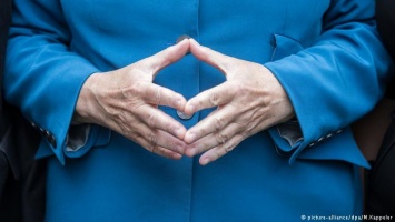 Смартфонный палец: чем поможет Меркель