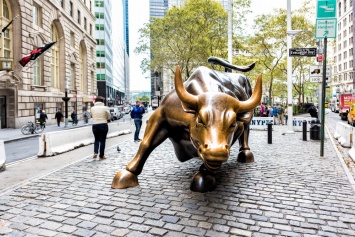 Материнская компания NYSE полностью использует потенциал Биткоина