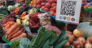 На Бессарабском рынке в Киеве теперь можно рассчитываться криптовалютой