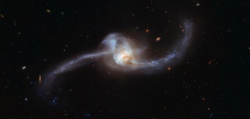 Найдена самая маленькая галактика-каннибал