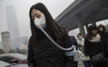 Воздух на вес золота: жуткие фотографии задушенного смогом Китая